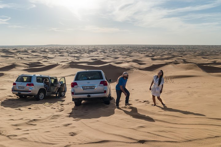 Dubai Red Dune Desert Safari: Camel Ride, Sandboarding & BBQ Options - Image 5