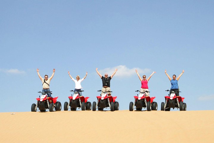 Dubai Red Dunes Safari by Quad Bike, Sand boarding, Camel Ride & BBQ Dinner - Image 1