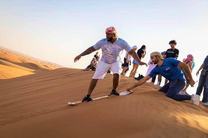 Dubai Red Dunes with Sandboarding, Camel Ride, Falcon & VIP Camp - Image 3