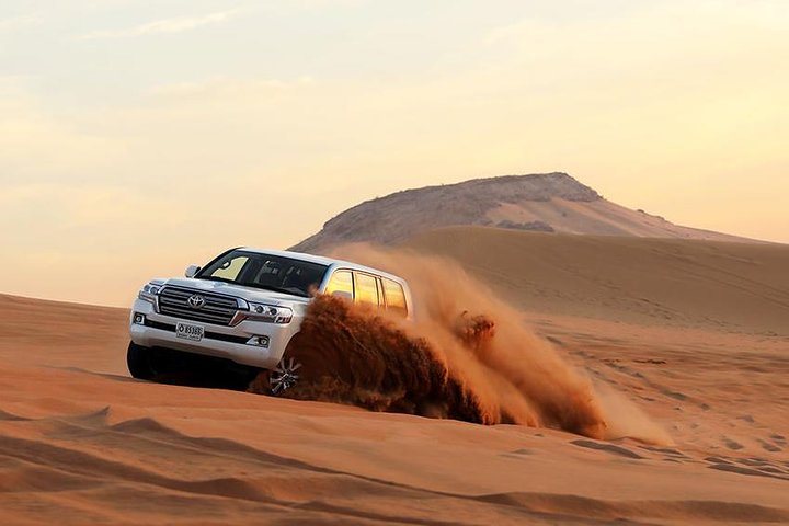 Dubai Safari: Dune Drive, Belly Dance, Camels & Meal - Image 1