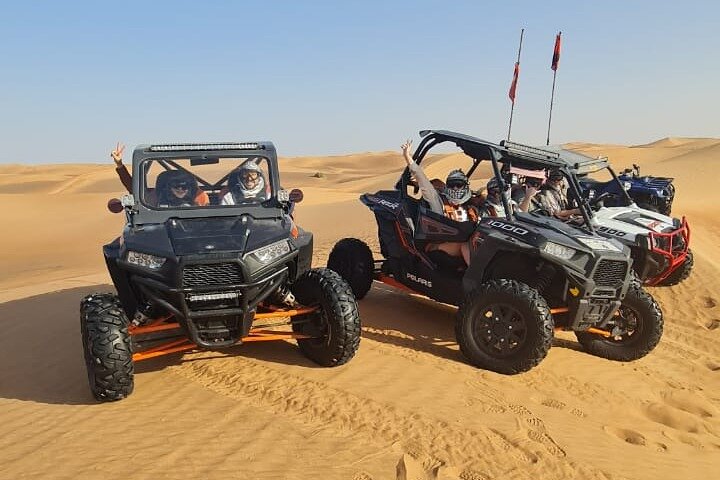 Dubai: Unique MORNING Buggy Red Dunes Safari with Sandboarding and Camel Ride - Image 1