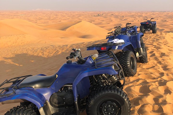 Dubai: Unique MORNING Quad Bike Red Dunes Safari - Image 1