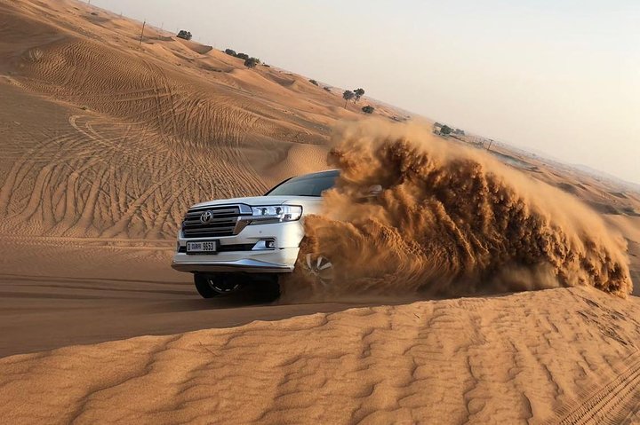 DXB Red Dune Desert Safari, Sand Boarding, Camel Ride, Live Shows, BBQ Dinner - Image 1