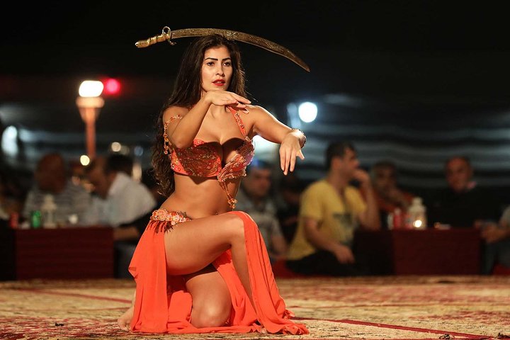 Evening Desert Safari Dubai With Buffet, Dune Bashing, Camel Riding, and Tanura - Image 4