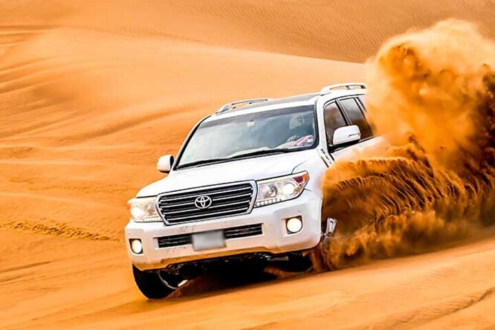 Evening Desert Safari Dubai with Camel Riding and BBQ Buffet Dinner - Image 1