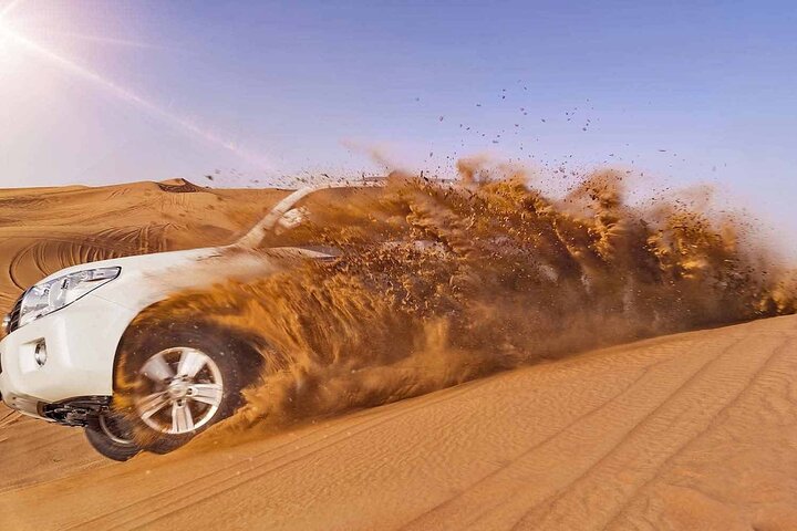 Evening Desert Safari Tour with Sand Surfing, BBQ Dinner (Exclusive Car) - Image 4
