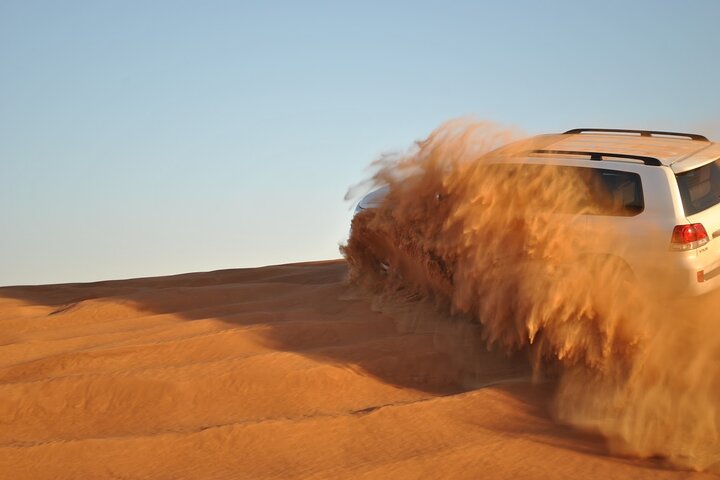 Evening Desert Safari Tour with Sand Surfing, BBQ Dinner (Exclusive Car) - Image 1