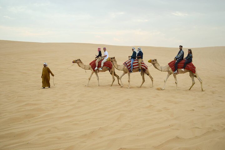 Evening Desert Safari Tour with Sand Surfing, BBQ Dinner (Exclusive Car) - Image 5