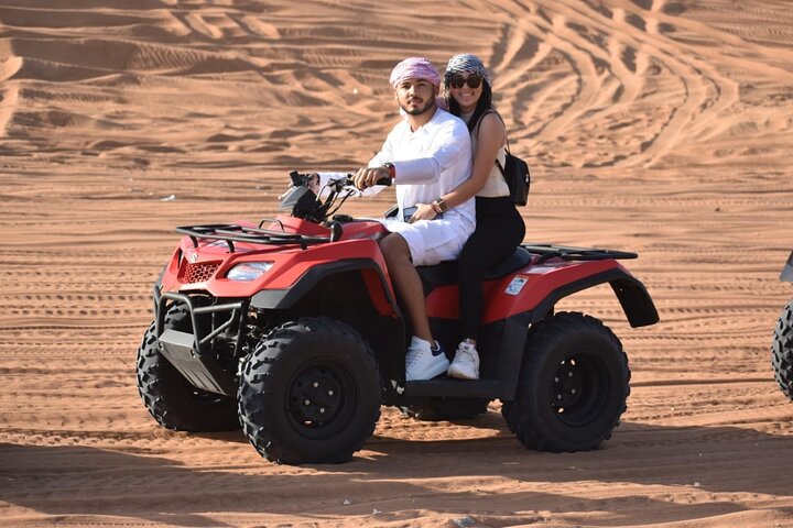 Evening Desert Safari with Quad Bike & BBQ Dinner/ Camel Trekking/ Sand Surfing - Image 1