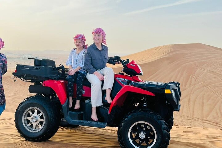 Evening Desert Safari with Quad Bike & BBQ Dinner/ Camel Trekking/ Sand Surfing - Image 2
