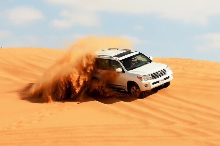 Evening Guided Tour with BBQ Dinner in Dubai Desert  - Image 2