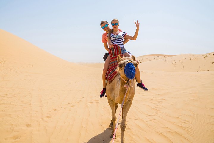 Evening Red Dunes Desert Safari Dubai with Sanboarding Camel ride & BBQ - Image 5