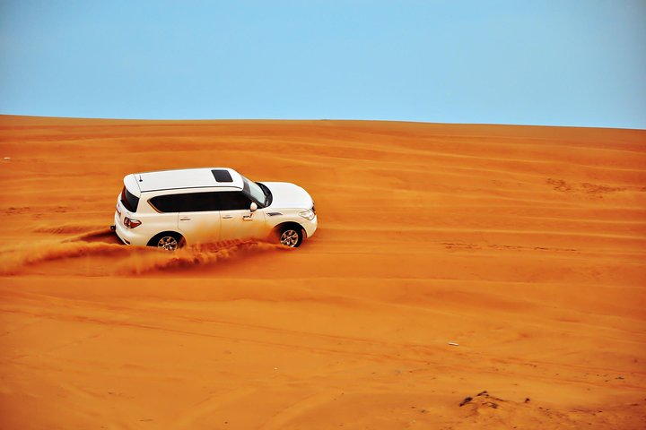 Evening Red Dunes Desert Safari With BBQ Dinner - Image 1