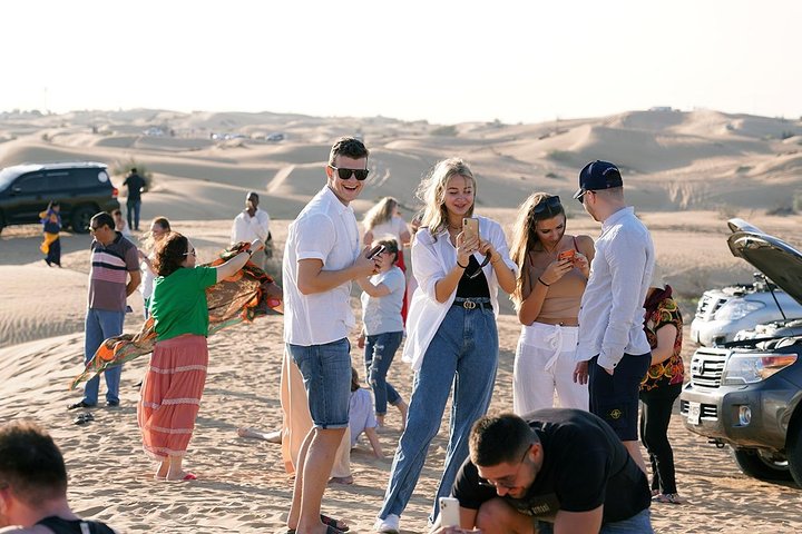 Exclusive Sunrise Desert Safari with Camel Ride Sand Boarding Dune Bashing - Image 5