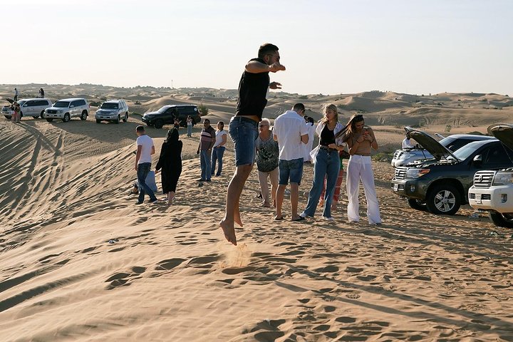 Exclusive Sunrise Desert Safari with Camel Ride Sand Boarding Dune Bashing - Image 4
