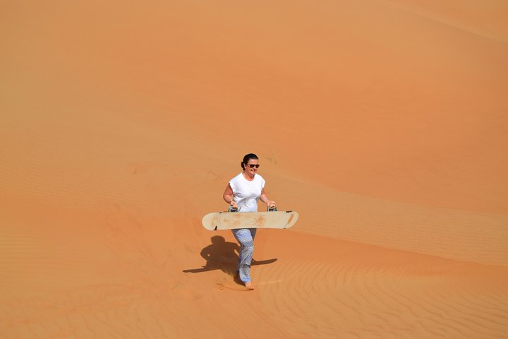 Exclusive Sunrise Desert Safari with Camel Ride Sand Boarding Dune Bashing - Image 1