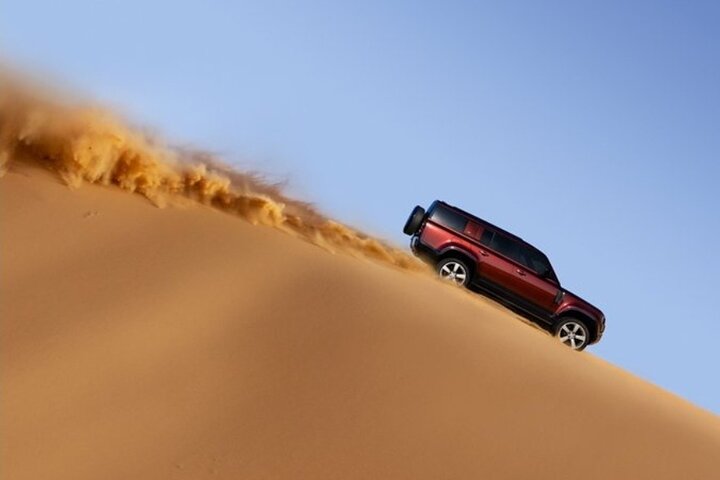 High Red Dunes Thrilling Desert Safari Sand Boarding BBQ Dinner - Image 1