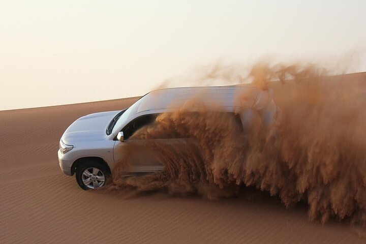 High Red Dunes Thrilling Desert Safari Sand Boarding BBQ Dinner - Image 4