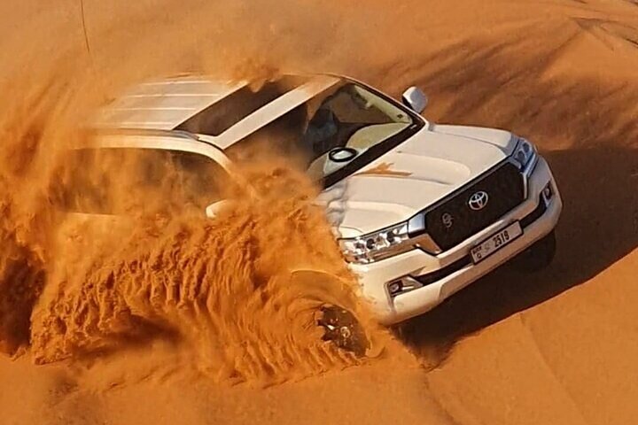 High Red Dunes Thrilling Desert Safari Sand Boarding BBQ Dinner - Image 2