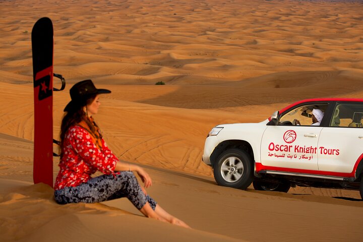 High Red Dunes with Camel Ride, Sandboarding, Falcon Show and VIP BBQ Dinner - Image 3