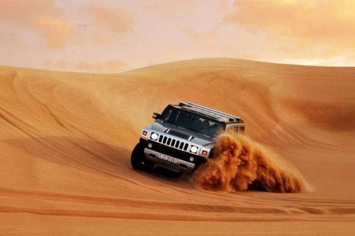 HUMMER Desert Safari Dubai | Camel Ride | Barbeque Dinner in Desert - Image 1