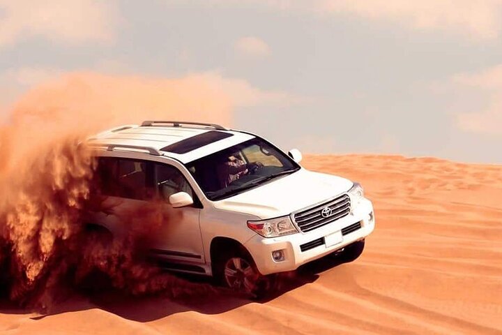 Morning 4x4 Desert Safari Dubai with Sandboarding and Camel Ride  - Image 1