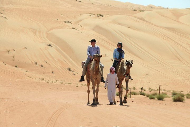 Morning Camel Trekking with Dune Bashing and Sand Boarding - Image 4