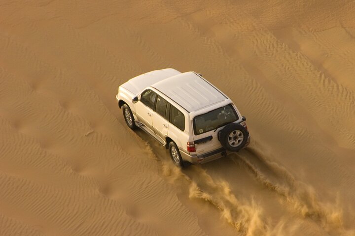 Morning Desert Safari plus Quad Bike, Sandboard and Camel ride - Image 5