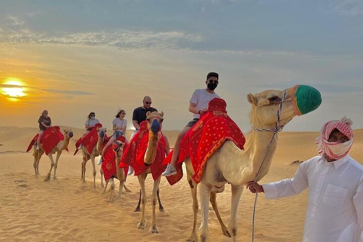 Morning Desert Safari Tour, Sand Boarding, camel riding on red Dunes  - Image 2