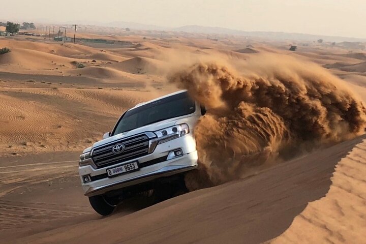 Morning Desert Safari with Camel Ride and Sand Boarding in Red Sand - Image 1