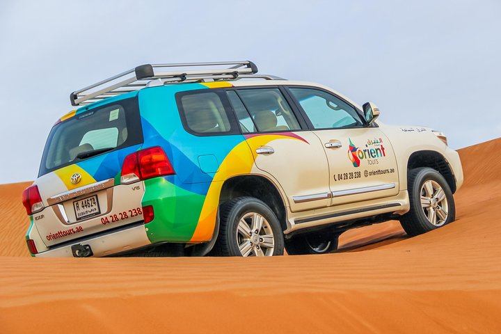 Morning Dubai Desert Safari with Camel Ride & Sand boarding - Image 1