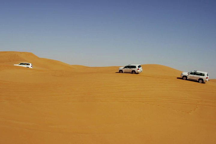 Morning Dubai Red Dunes Safari With Camel Ride & Sand boarding - Image 1