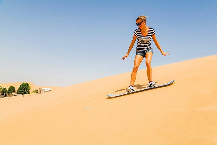 Morning Dune Bashing With Sand Boarding And Camel Ride in Red Dunes Desert  - Image 2
