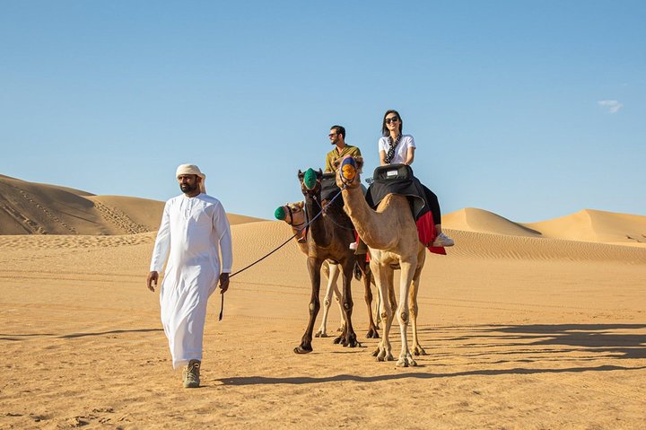 Morning Dune Bashing With Sand Boarding And Camel Ride in Red Dunes Desert  - Image 4
