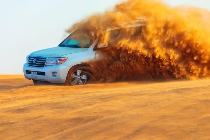 Morning Dune Bashing With Sand Boarding And Camel Ride in Red Dunes Desert  - Image 3