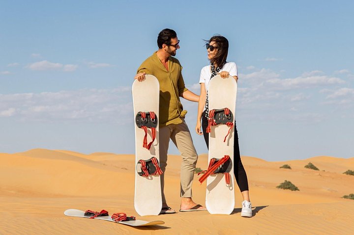 Morning Dune Bashing With Sand Boarding And Camel Ride in Red Dunes Desert  - Image 5