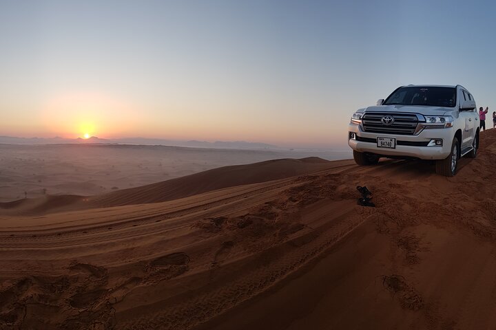 Morning Red Dune Desert Safari in Dubai with Camel Ride and Sand Boarding - Image 2
