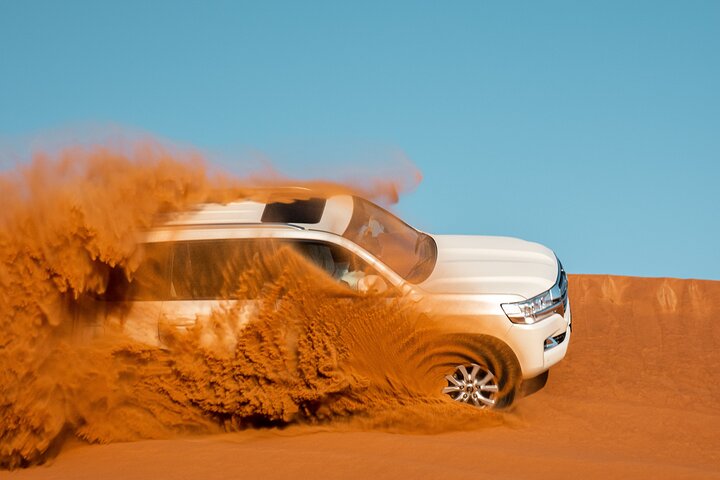 Morning Red Dune Desert Safari in Dubai with Camel Ride and Sand Boarding - Image 5