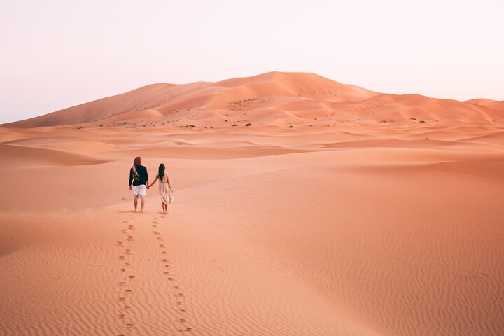 Morning Red Dune Desert Safari with Sandboarding, camelride & more - Image 1
