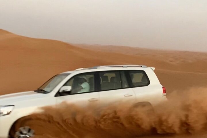 Morning Red Dune Safari with Sandboarding and Camel Ride - Image 2