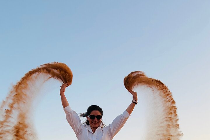 Morning Red Dune Safari with Sandboarding and Camel Ride - Image 1