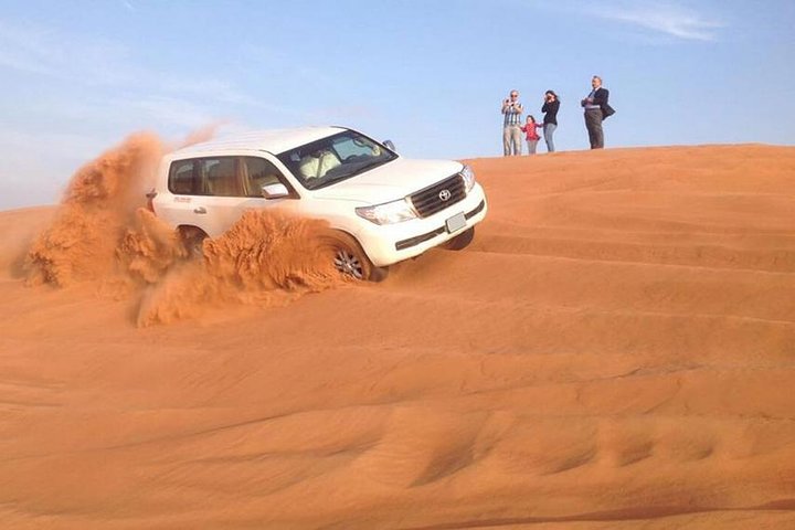 Morning Red Dunes Desert by Quad Bike, Dune Bashing, Camel Ride & Sandboarding - Image 4