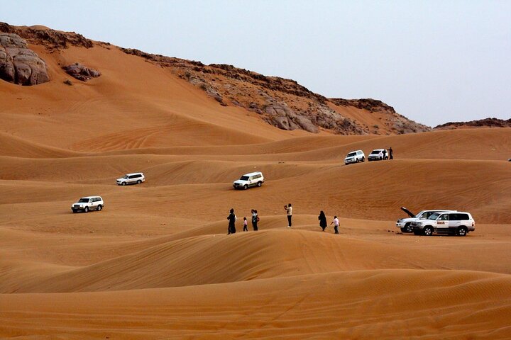 Morning Thrilling Dune bashing , Send Boarding & Camel ride - Image 1