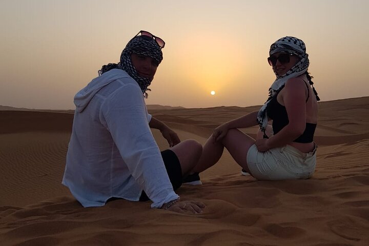 Morning Thrilling Dune bashing , Send Boarding & Camel ride - Image 5