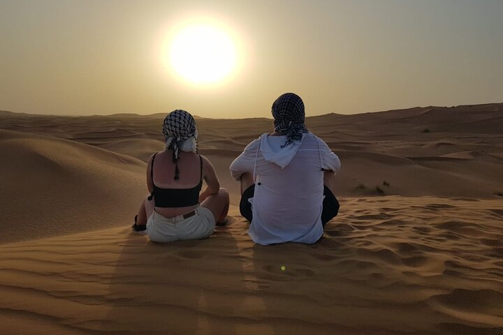 Morning Thrilling Dune bashing , Send Boarding & Camel ride - Image 4