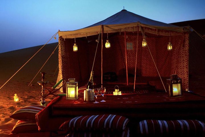 Overnight Dubai Desert Camping- Camel and 4x4 Safari with BBQ and Belly Dance - Image 1