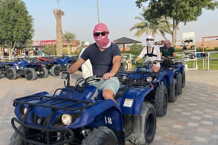 Premium Desert Excursion 1 Hour Quad bike Camel ride BBQ Dinner - Image 4