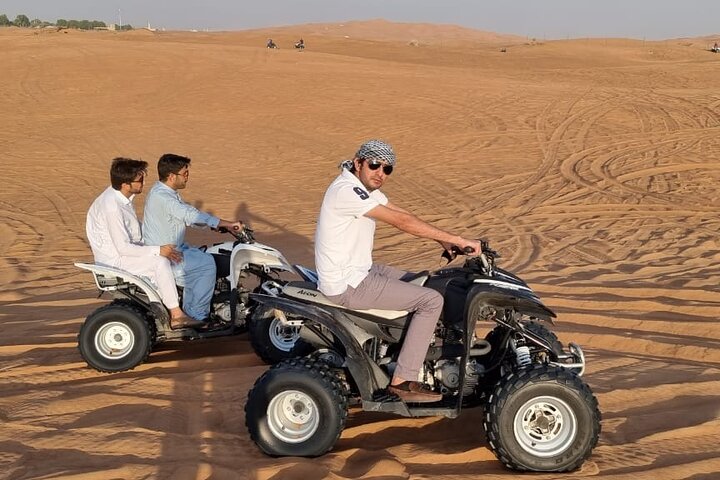 Premium Desert Excursion 1 Hour Quad bike Camel ride BBQ Dinner - Image 2