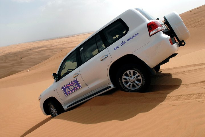 Premium Desert Safari, BBQ, 3 Shows, Camel Ride at Majlis Camp - Image 1