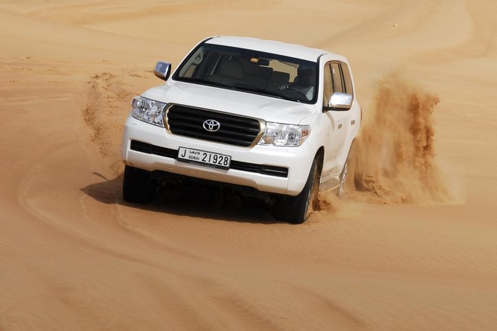 Premium Red Dune Desert Safari,BBQ dinner, camel ride, live show at Majilis camp - Image 1